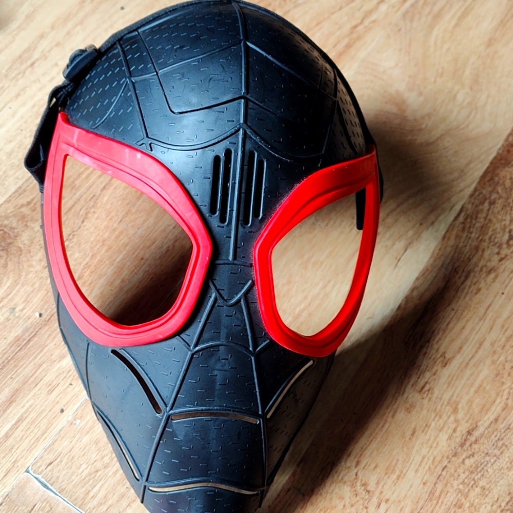 Genuine Spiderman Mask. Made to last. With elastic adjustment for all sizes